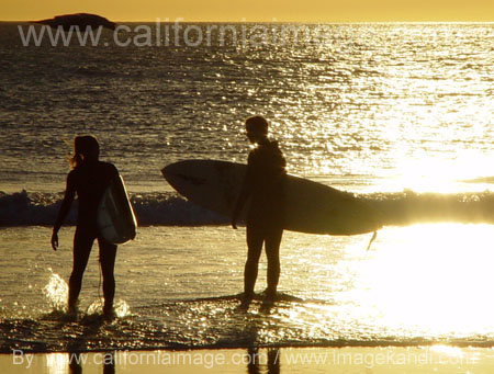 Two Surfers and Golden Sunset